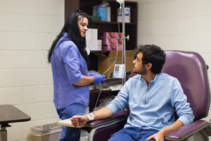 Infusion nurse and patient in Hillsdale Hospital Center for Infusion Care