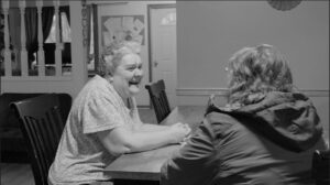 Nina Smith and her sister, Carol sitting together.